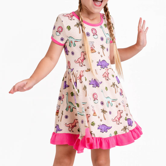 PREHISTORIC PARADISE | TWIRL DRESS - PINK TRIM PASTEL DINOS | READY TO SHIP